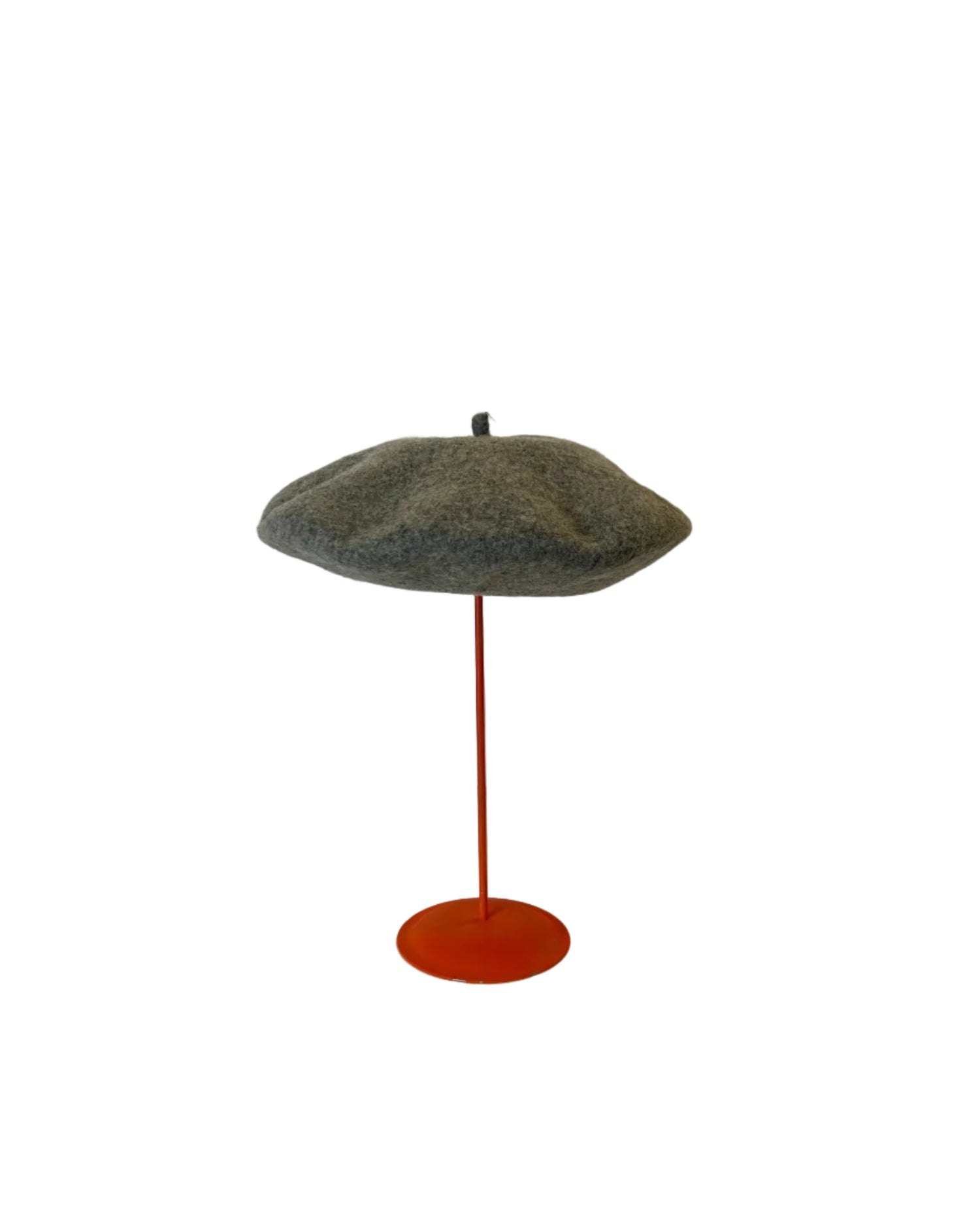 Gray Beret on a red stand against a white background
