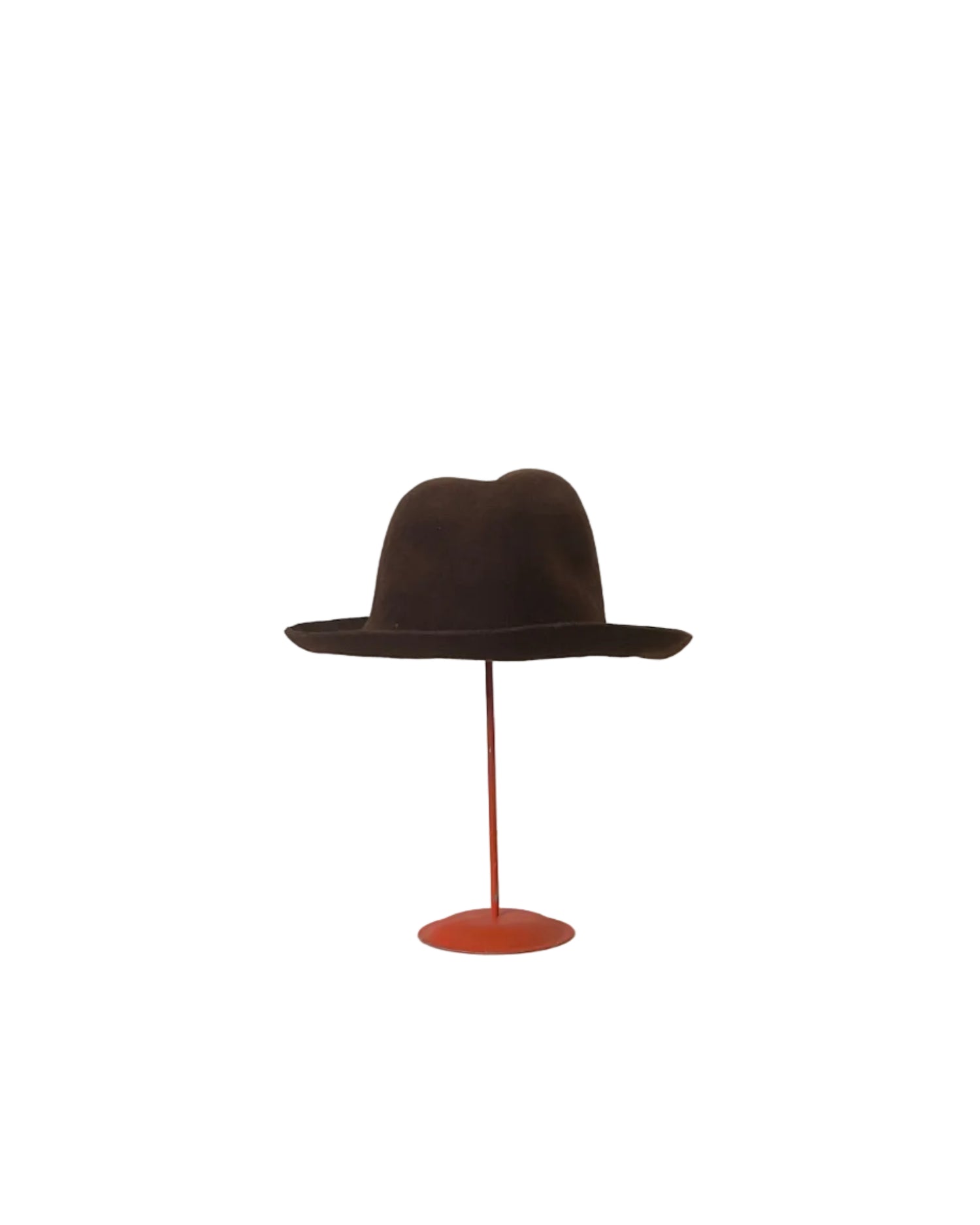 Brown hat on a red stand against a white backdrop